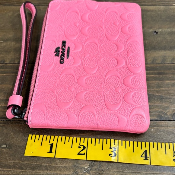 Coach Signature Embossed Pebbled Leather Corner Zip Wristlet in Pink - Picture 9 of 9